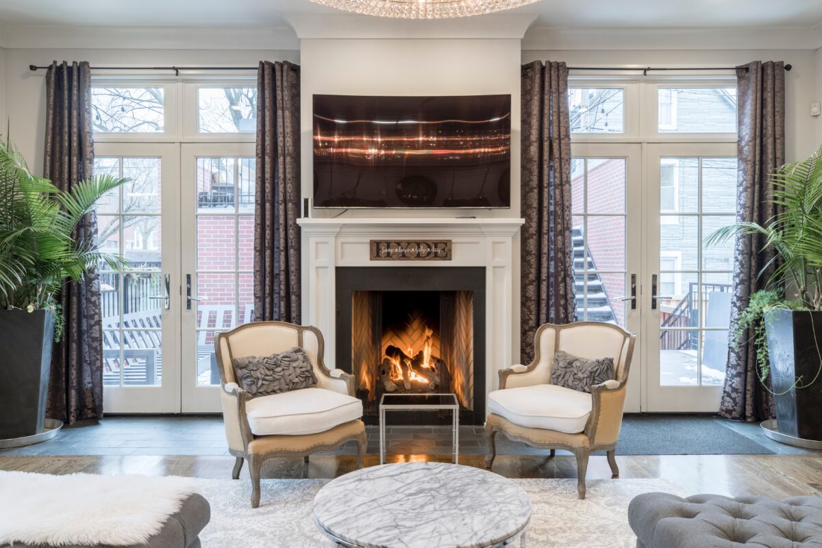 a living room with a fireplace as a focal point