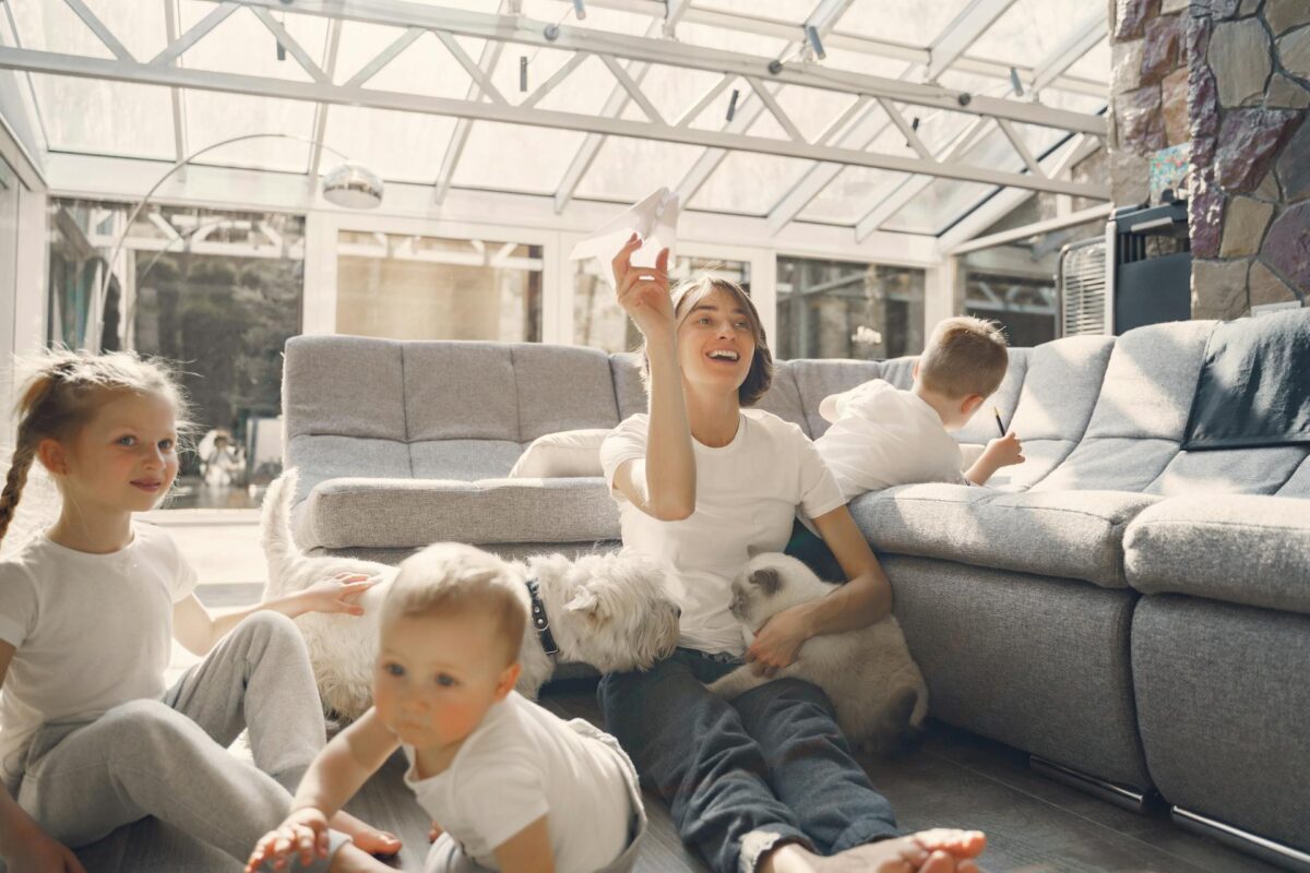 Mother playing with her children 